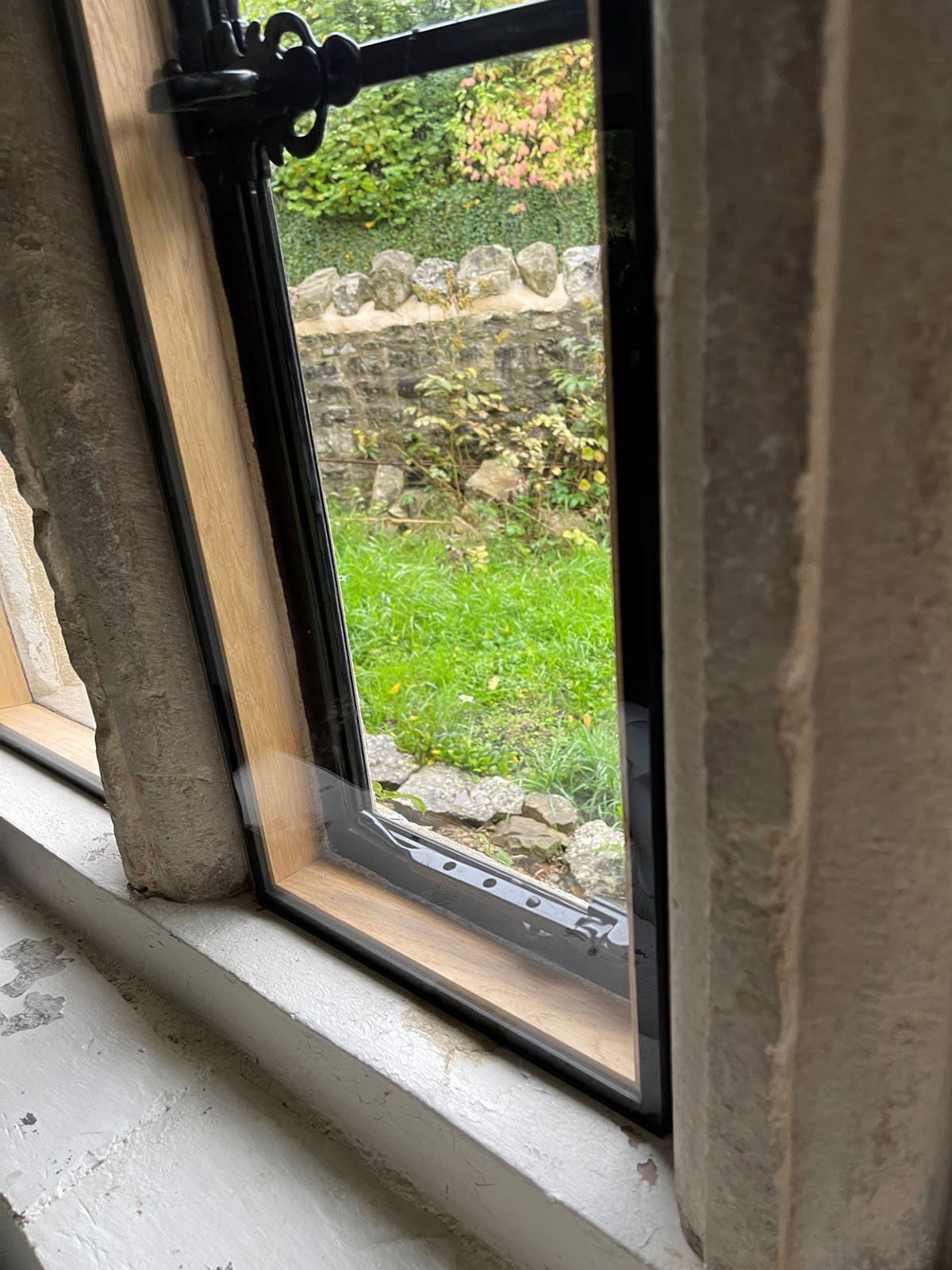 Secondary glazing for stone mullion windows