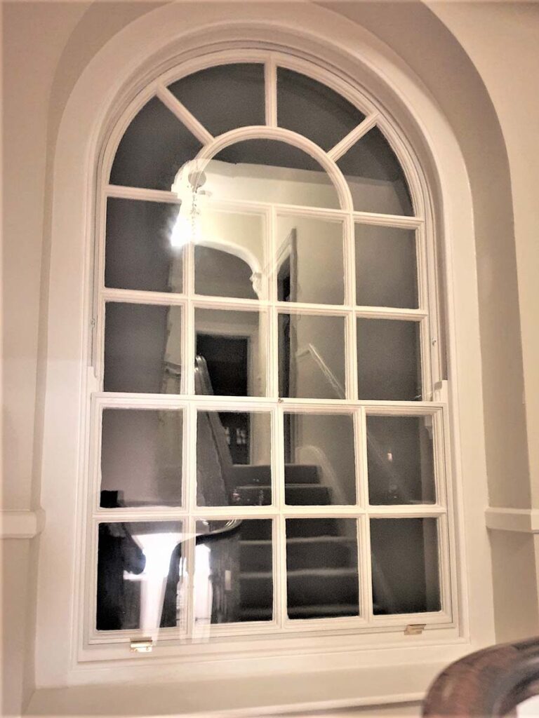 Integrated CosyGlazing Secondary Glazing on an arched sash